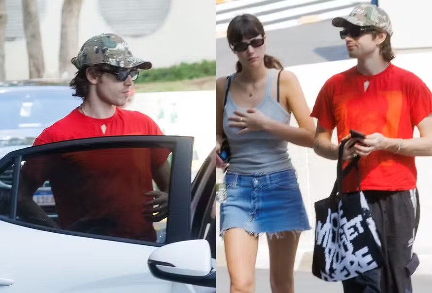 Filho de Bono Vox passeia com a namorada em SP antes de show no Lollapalooza