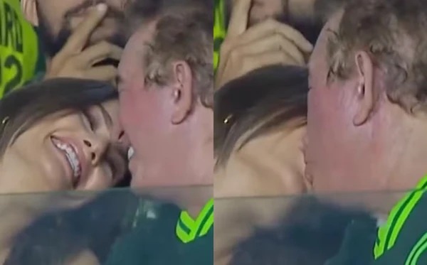 Amado Batista e esposa miss são filmados aos beijos em jogo de futebol