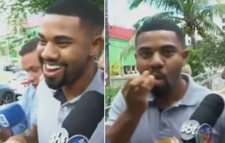 Ex-BBB Davi Brito ri e come pipoca ao deixar delegacia em Salvador