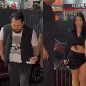 Marrone chega em show de mãos dadas com jovem