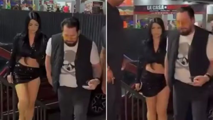 Marrone chega em show de mãos dadas com jovem
