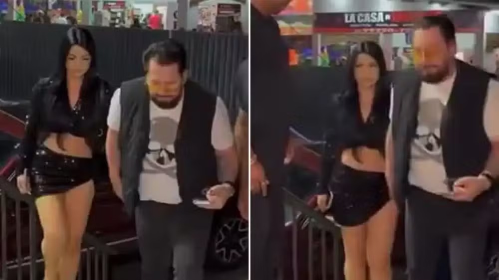 Marrone chega em show de mãos dadas com jovem