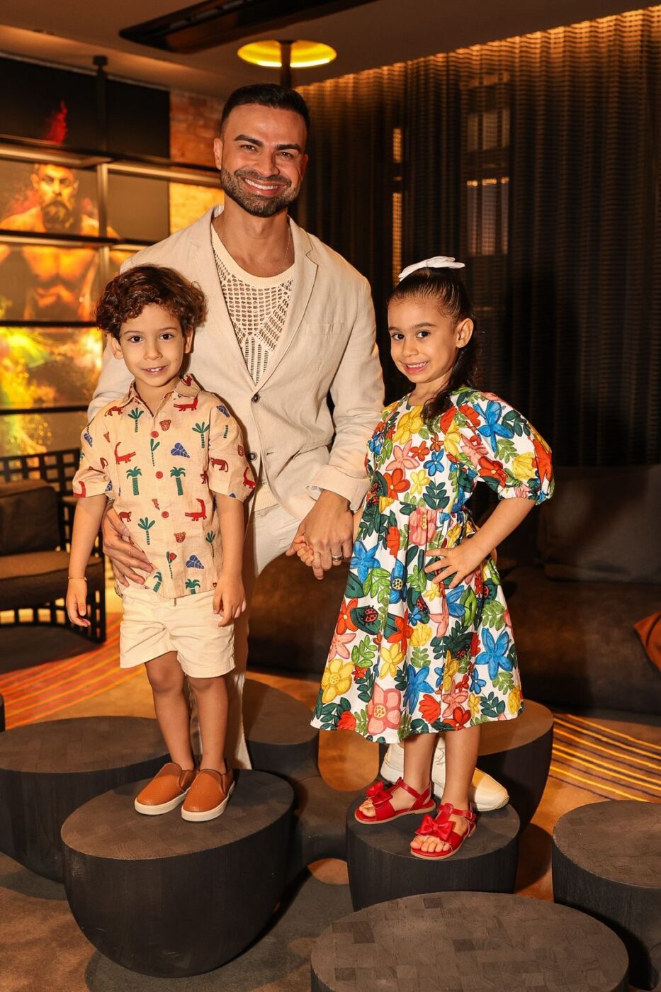 Flávio, Caio e Laís Moura