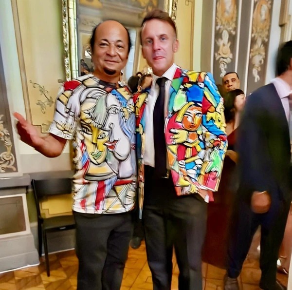 Macron se encanta com arte de Menelaw Sete e ganha blazer do artista durante jantar oficial em Salvador
