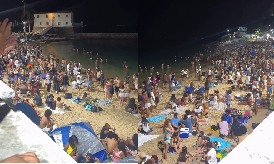Luau atrai multidão à praia do Porto da Barra na madrugada; veja vídeos