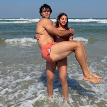 Filho de Carla Perez e Xanddy diverte público ao ser carregado pela noiva em praia: ‘Meu grande homem’