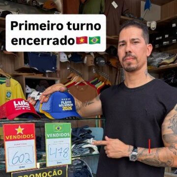 Comerciante de Feira faz disputa de venda de bonés políticos e revela o resultado da sua “pesquisa eleitoral”